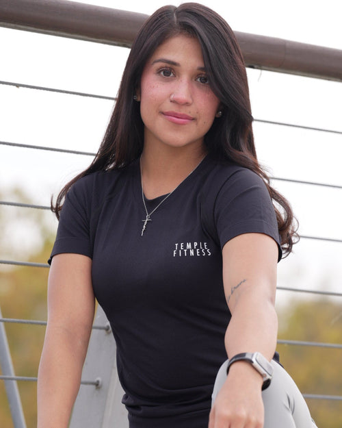 Woman sitting on a chair with a blurred outdoor background